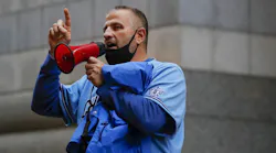 Local Fraternal Order of Police President John Catanzara speaks out against the city's vaccine mandate at a rally outside City Hall in October.
