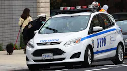 New York Police Department traffic officers have a conversation in October in downtown Brooklyn in New York City.