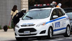 New York Police Department traffic officers have a conversation in October in downtown Brooklyn in New York City. New York Police Department traffic officers have a conversation in October in downtown Brooklyn in New York City.