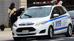 New York Police Department traffic officers have a conversation in October in downtown Brooklyn in New York City.
