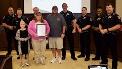 Allison Shellstrom stands next to North Augusta, SC, Public Safety Lt. Aaron Fittery after she was honored by city officials for helping Fittery after he had been wounded in a Dec. 9 shootout. Allison Shellstrom stands next to North Augusta, SC, Public Safety Lt. Aaron Fittery after she was honored by city officials for helping Fittery after he had been wounded in a Dec. 9 shootout.