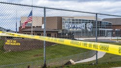 Flags wave at the rear entrance of Oxford, MI, High School on Dec. 2 after an active shooter situation Nov. 30 at the school that left four students dead and seven others with injuries. Flags wave at the rear entrance of Oxford, MI, High School on Dec. 2 after an active shooter situation Nov. 30 at the school that left four students dead and seven others with injuries.