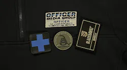 An embroidered shirt from 511 Tactical, challenge coin from Combat Swag and a personalized patch from BLACKHAWK. Examples of marketing materials.