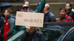 Fraternal Order of Police members and supporters rally outside Chicago City Hall against the vaccine mandate for city employees in October.