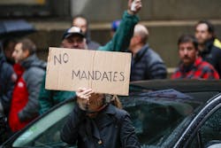 Fraternal Order of Police members and supporters rally outside Chicago City Hall against the vaccine mandate for city employees in October. Fraternal Order of Police members and supporters rally outside Chicago City Hall against the vaccine mandate for city employees in October.