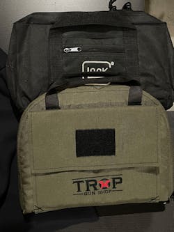 Embroidering items for special events can be done as well. These are embroidered soft pistol cases: one for Glock and one for TROP Gun Shop (Harrisburg, PA).