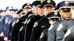 Austin, TX, police cadets participate in a commencement exercise in May 2019.