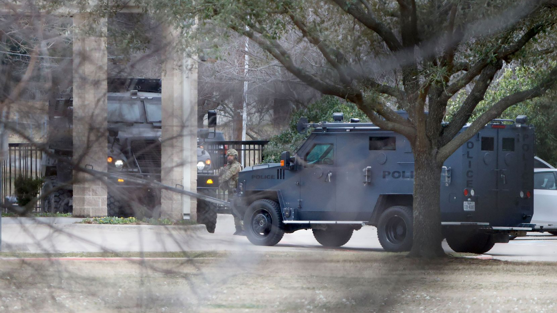 Armored vehicles are seen outside Congregation Beth Israel in Colleyville, TX, on Saturday.