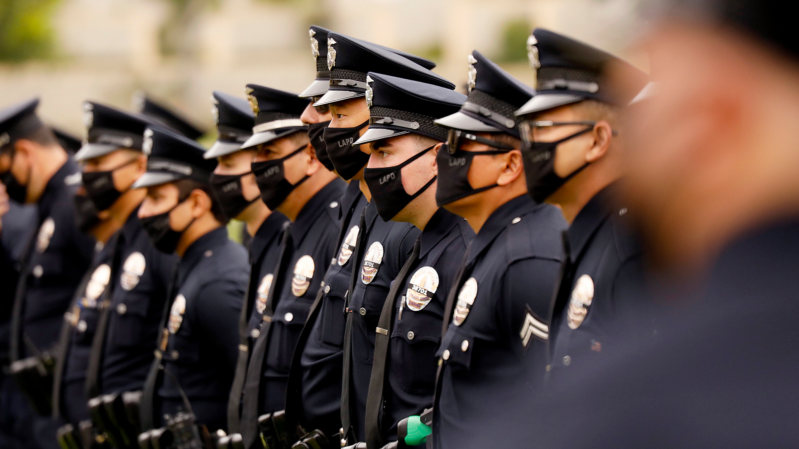 LAPD officers attend the funeral of Officer Valentin Martinez, the agency&rsquo;s first sworn employee to die from COVID-19, in August 2020.