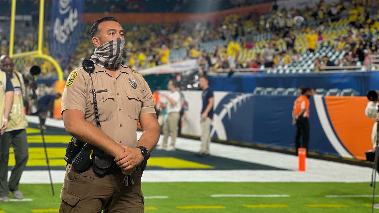 A Miami-Dade police officer works during the Capital One Orange Bowl on Dec. 31.