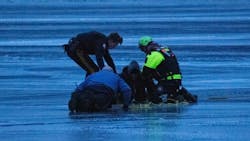 Netcong, NJ, police and firefighters rescued three people who tell through the ice on a lake Sunday. Netcong, NJ, police and firefighters rescued three people who tell through the ice on a lake Sunday.