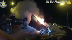 Pasco County, FL, Sheriff’s Office deputies used fire extinguishers to put out flames before saving a woman who was trapped inside a crashed car that caught fire.