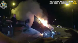 Pasco County, FL, Sheriff’s Office deputies used fire extinguishers to put out flames before saving a woman who was trapped inside a crashed car that caught fire. Pasco County, FL, Sheriff’s Office deputies used fire extinguishers to put out flames before saving a woman who was trapped inside a crashed car that caught fire.