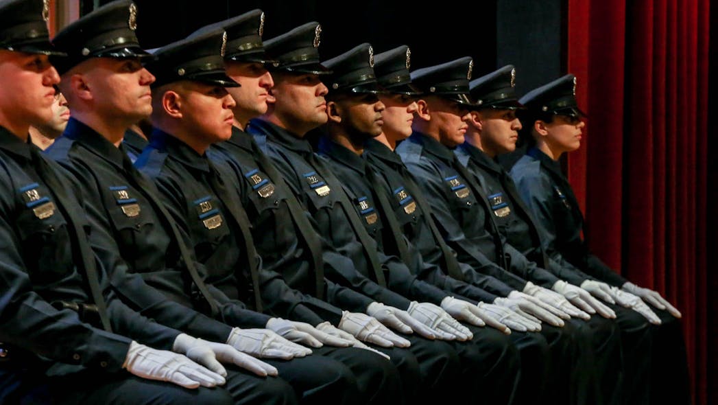 Recruits who completed 24 weeks of training graduate from the 70th Providence, RI, Police Department Training Academy during a ceremony at Bishop McVinney Auditorium.
