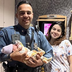 Massachusetts State Police Trooper Jose Cabrera holds the newborn baby boy who was delivered Wednesday after Cabrera rushed the expecting mom to the hospital following a traffic stop in West Springfield. Massachusetts State Police Trooper Jose Cabrera holds the newborn baby boy who was delivered Wednesday after Cabrera rushed the expecting mom to the hospital following a traffic stop in West Springfield.