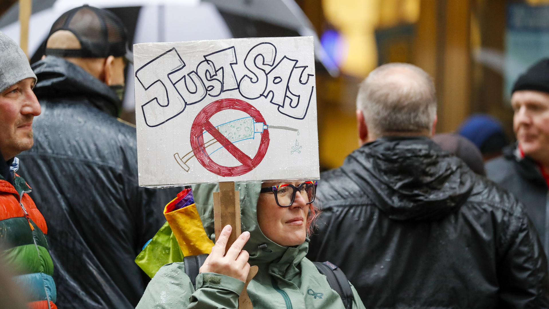 Members of the Fraternal Order of Police, along with supporters, rally outside Chicago City Hall in October to protest the city's COVID-19 vaccine mandate.