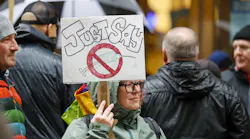 Members of the Fraternal Order of Police, along with supporters, rally outside Chicago City Hall in October to protest the city's COVID-19 vaccine mandate.