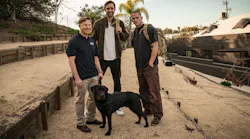 (Left to right) Navy Captain Jon, with Labrador Winston; 'Dog' Co-Director Reid Carolin; and 'Dog' Co-Director and Actor Channing Tatum.