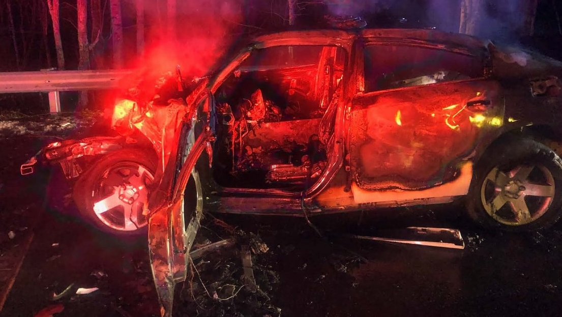 A bystander pulled Marion, NC, Police Officer Breanna Toney from her burning patrol car after she was in a head-on collision with a pickup truck in Mitchell County on Monday.