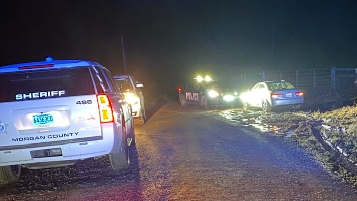 A woman jumped from a moving car during a chase with police officers and deputies from multiple counties Sunday.