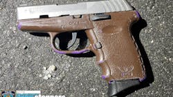 NYPD officials released a photo of the gun that was used to wound an off-duty officer during an attempted carjacking in Queens on Tuesday. NYPD officials released a photo of the gun that was used to wound an off-duty officer during an attempted carjacking in Queens on Tuesday.