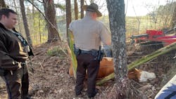 Three Pickens County, GA, deputies worked for several hours to rescue a cow tangled in a fence. Three Pickens County, GA, deputies worked for several hours to rescue a cow tangled in a fence.