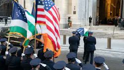 NYPD Officer Wilbert Mora's casket arrives at St. Patrick's Cathedral for the officer's wake on Tuesday. NYPD Officer Wilbert Mora's casket arrives at St. Patrick's Cathedral for the officer's wake on Tuesday.