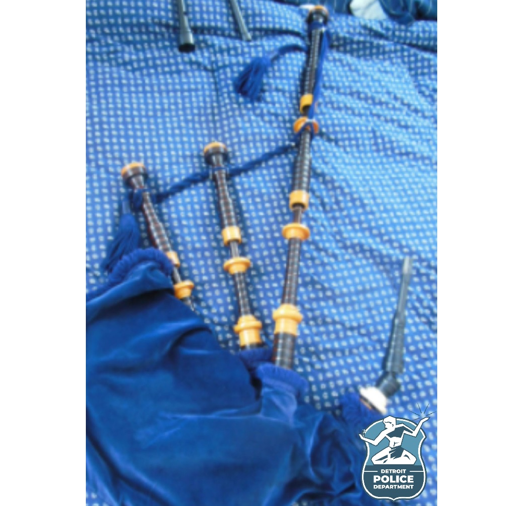 A Detroit police officer's bagpipe and gear was stolen from his personal vehicle Friday.