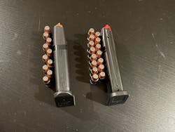 Ten rounds in the stock magazine (left) versus 15 rounds in the Shield Arms magazine (right). You hope you never need them, but extra capacity is good.
