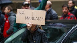 Members of the Fraternal Order of Police and supporters rally outside of City Hall in opposition to the COVID-19 vaccine mandate for city workers. Members of the Fraternal Order of Police and supporters rally outside of City Hall in opposition to the COVID-19 vaccine mandate for city workers.