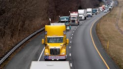 Participants of the People's Convoy drive the beltway around Washington, D.C., near Cabin John, MD, on Sunday. Participants of the People's Convoy drive the beltway around Washington, D.C., near Cabin John, MD, on Sunday.