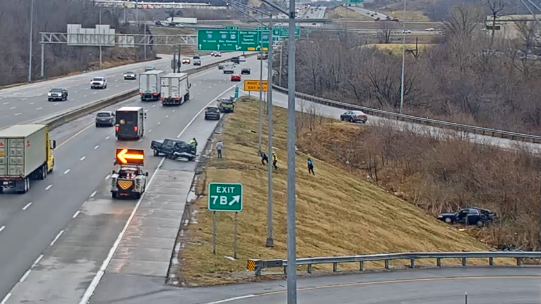 A Kansas City, MO, police officer and another driver were injured in a collision along Interstate 70 on Thursday.