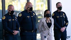 Manny Morales (second from left) was named the new permanent chief of the Miami Police Department on Monday. Manny Morales (second from left) was named the new permanent chief of the Miami Police Department on Monday.