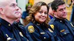 Mary O'Connor (center) listens from the front row of the audience to comments about her nomination as Tampa chief of police. She is flanked by assistant chiefs Lee Bercaw (left) and Ruben 'Butch' Delgado, who served earlier as interim chief and was a candidate for the permanent job.