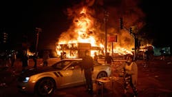An AutoZone store burns as protesters gather outside of the Third Precinct in Minneapolis in the days after George Floyd s death in 2020. An AutoZone store burns as protesters gather outside of the Third Precinct in Minneapolis in the days after George Floyd s death in 2020.
