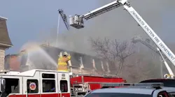 South Brunswick, NJ, police and firefighters caught a young boy who was tossed by his father from a second-floor balcony early Monday to escape an apartment complex fire.