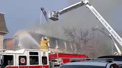 South Brunswick, NJ, police and firefighters caught a young boy who was tossed by his father from a second-floor balcony early Monday to escape an apartment complex fire. South Brunswick, NJ, police and firefighters caught a young boy who was tossed by his father from a second-floor balcony early Monday to escape an apartment complex fire.