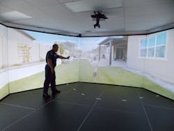 An officer takes part in a Law Enforcement Dog Encounters Training program (LEDET) scenario in VirTra&apos;s training simulator.