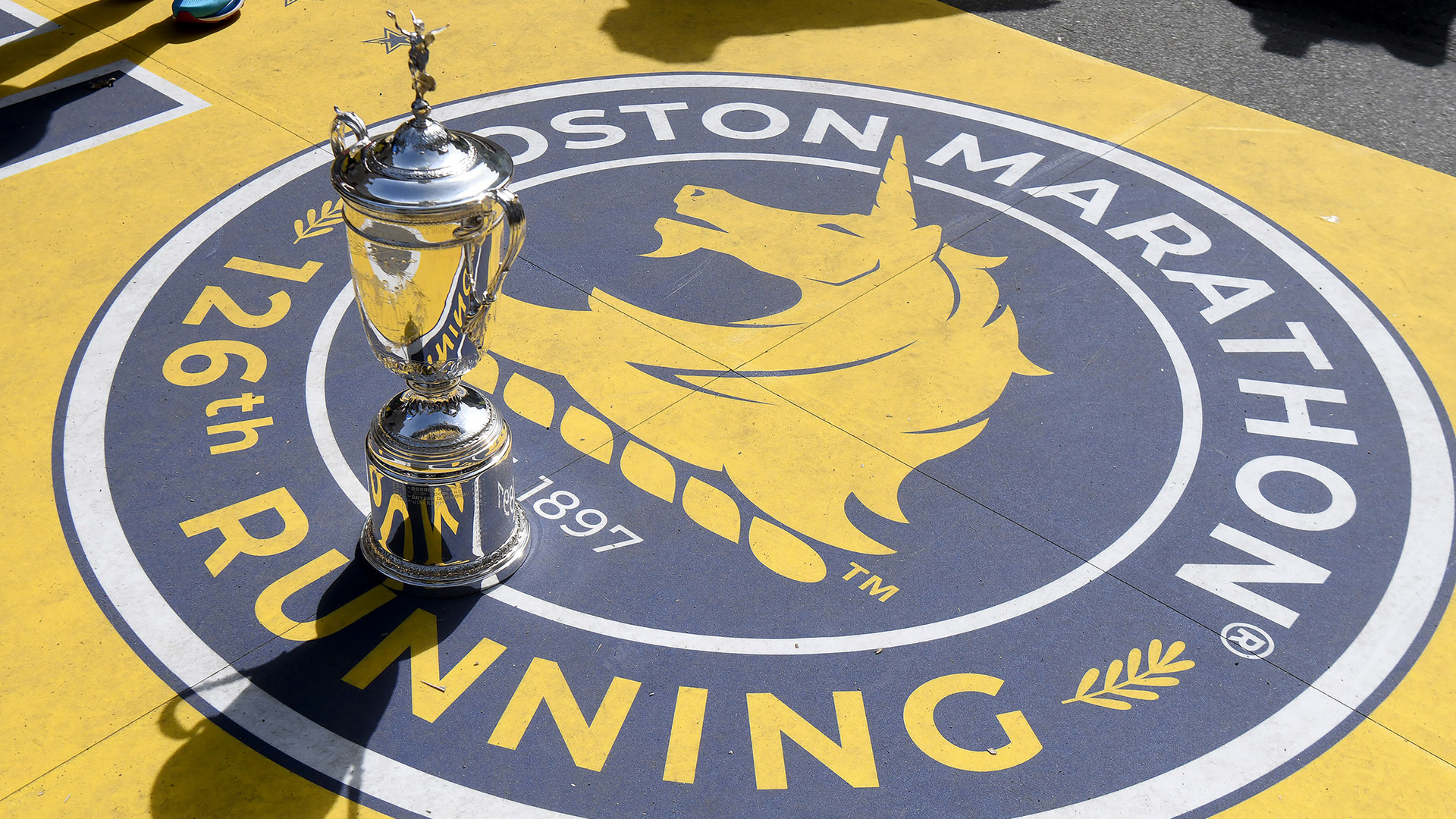 The Boston Marathon trophy sits at the finish line Sunday.