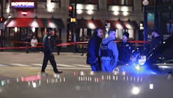 Chicago police work the scene at Grand and State in Chicago's Near North neighborhood after an accident involving a police officer on April 9, 2022. Chicago police work the scene at Grand and State in Chicago's Near North neighborhood after an accident involving a police officer on April 9, 2022.