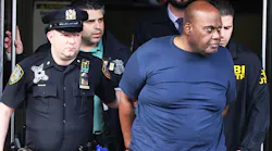Frank James is led by NYPD officers after his arrest Wednesday in connection to the mass shooting at a Brooklyn subway station earlier this week.