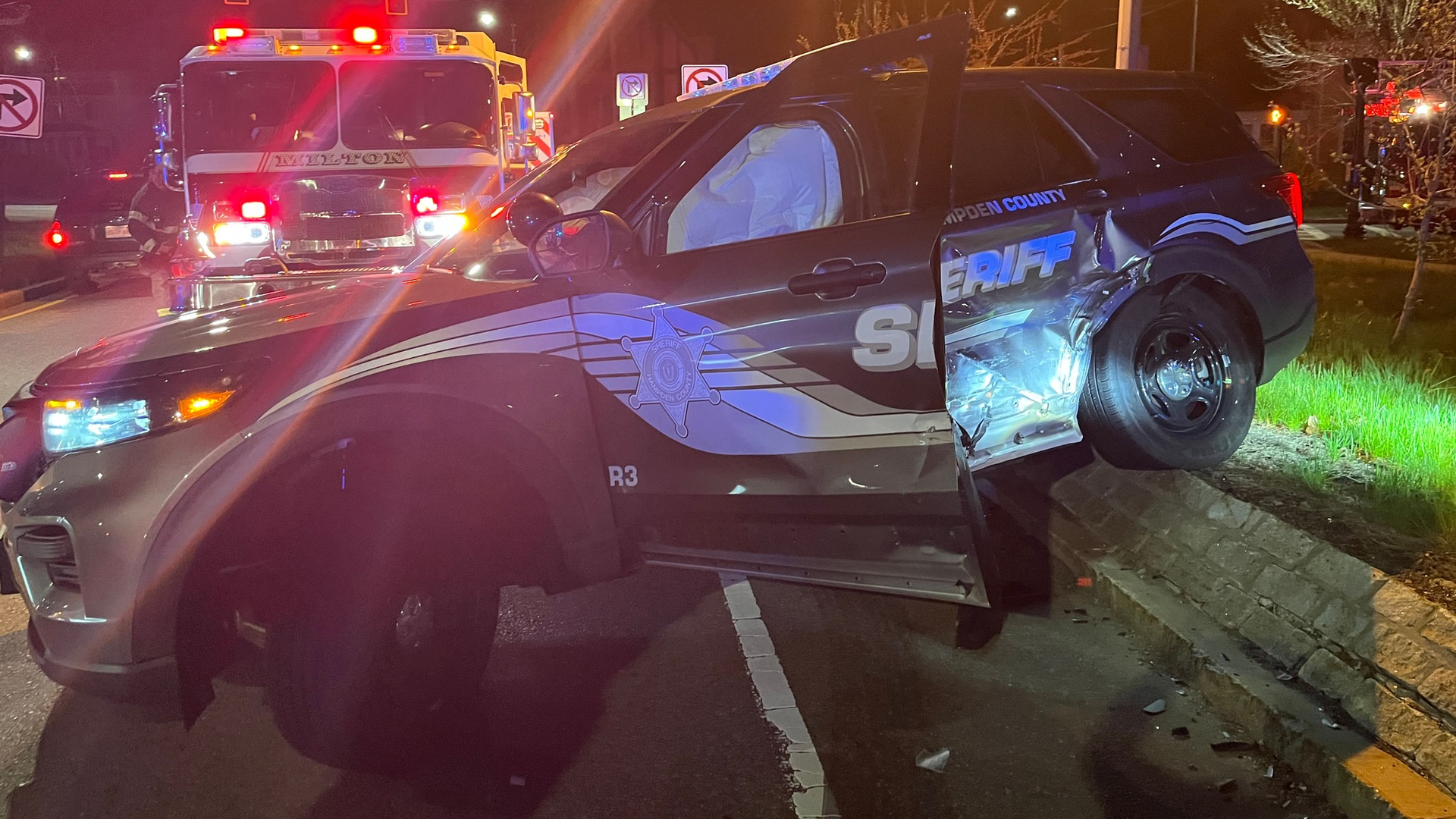 A Hampden County, MA, Sheriff's Department corrections officer was heading to a Jamaica Plains hospital early Monday to cover a security shift for an inmate when his cruiser was struck by a drunken driver.