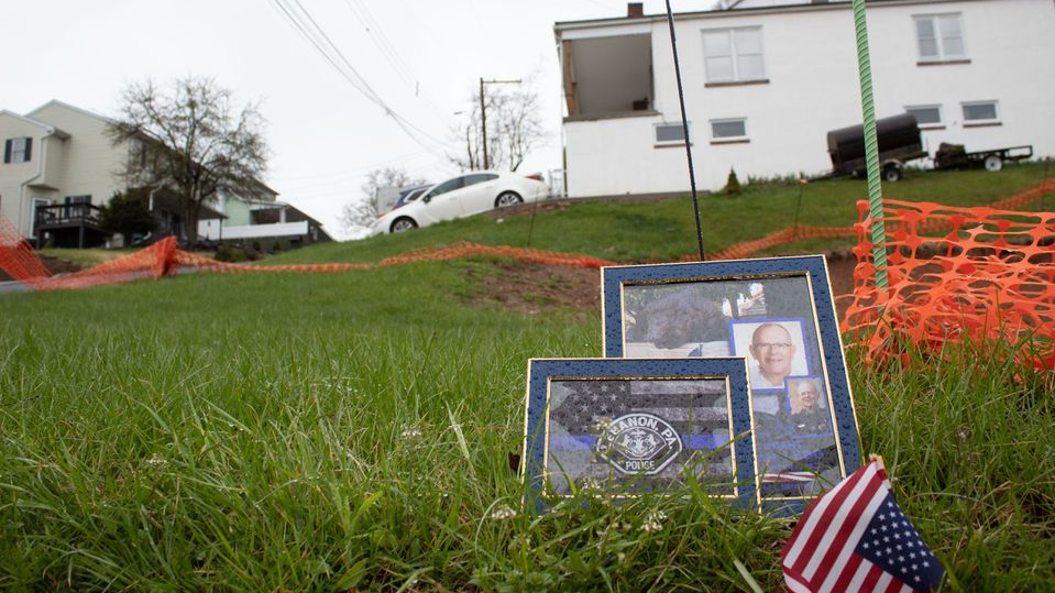 A memorial for slain Lebanon City, PA, Police Lt. William Lebo sits outside the home where he was fatally shot by a burglary suspect March 31.