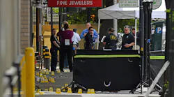 Sacramento, CA, police investigate the scene of a mass shooting Sunday. Six people were killed, and 12 others were injured.