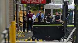 Sacramento, CA, police investigate the scene of a mass shooting Sunday. Six people were killed, and 12 others were injured. Sacramento, CA, police investigate the scene of a mass shooting Sunday. Six people were killed, and 12 others were injured.
