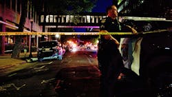 Sacramento, CA, Police Officer David Bell stands watch at the scene of a mass shooting that left six people dead and 12 injured Sunday. Sacramento, CA, Police Officer David Bell stands watch at the scene of a mass shooting that left six people dead and 12 injured Sunday.