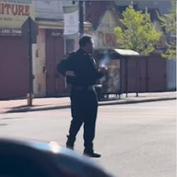 In a video posted online Wednesday, a comedian is seen impersonating a police officer and directing traffic while apparently smoking marijuana, which recently haveen legalized in the state. In a video posted online Wednesday, a comedian is seen impersonating a police officer and directing traffic while apparently smoking marijuana, which recently haveen legalized in the state.