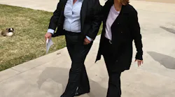 Former Aurora, CO, Police Chief Vanessa Wilson (left) leaves with her attorney, Paula Greisen, after a press conference Monday.