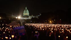 Thousands attended the 34th Annual Candlelight Vigil hosted by the National Law Enforcement Officers Memorial Fund took place on the National Mall in Washington, D.C., on May 13. Thousands attended the 34th Annual Candlelight Vigil hosted by the National Law Enforcement Officers Memorial Fund took place on the National Mall in Washington, D.C., on May 13.