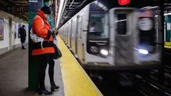 A commuter waits for a subway train at a station in New York City in 2021. A commuter waits for a subway train at a station in New York City in 2021.